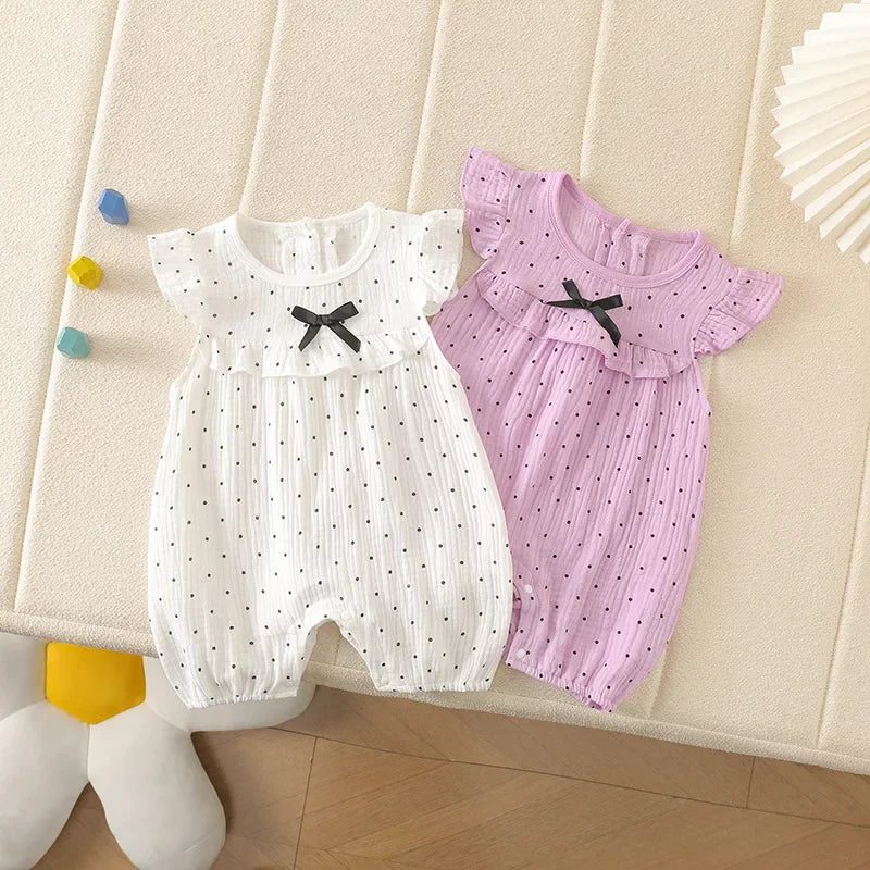Combinaison bébé fille à pois et nœud papillon
